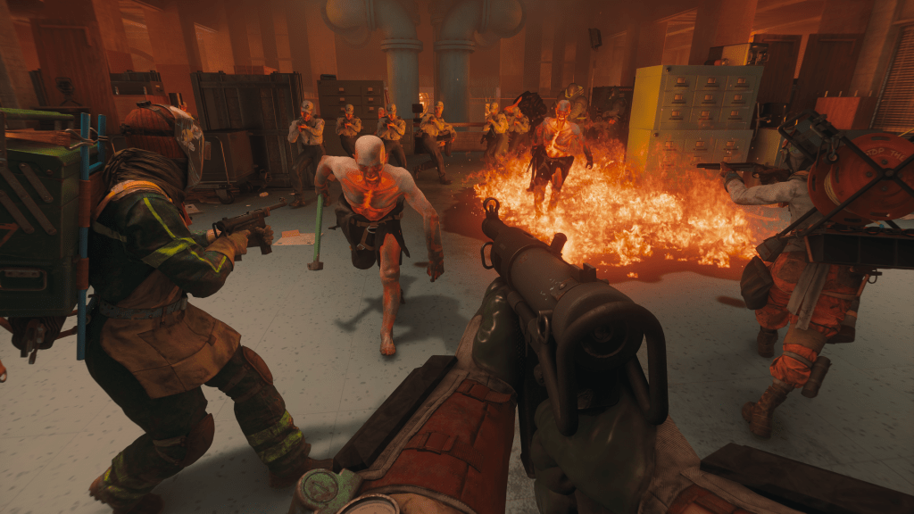 A chaotic scene in a game environment featuring multiple characters, some armed, engaged in combat against fiery enemies in a dimly lit room with scattered objects.