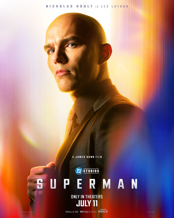 Nicholas Hoult as Lex Luthor in a dramatic pose with a colorful background, promoting the new Superman film.